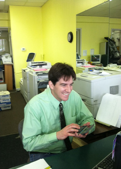 A photo of Paul Franke, a graphic artist and printer working at Moss Printing in Mission and Merriam, Kansas
